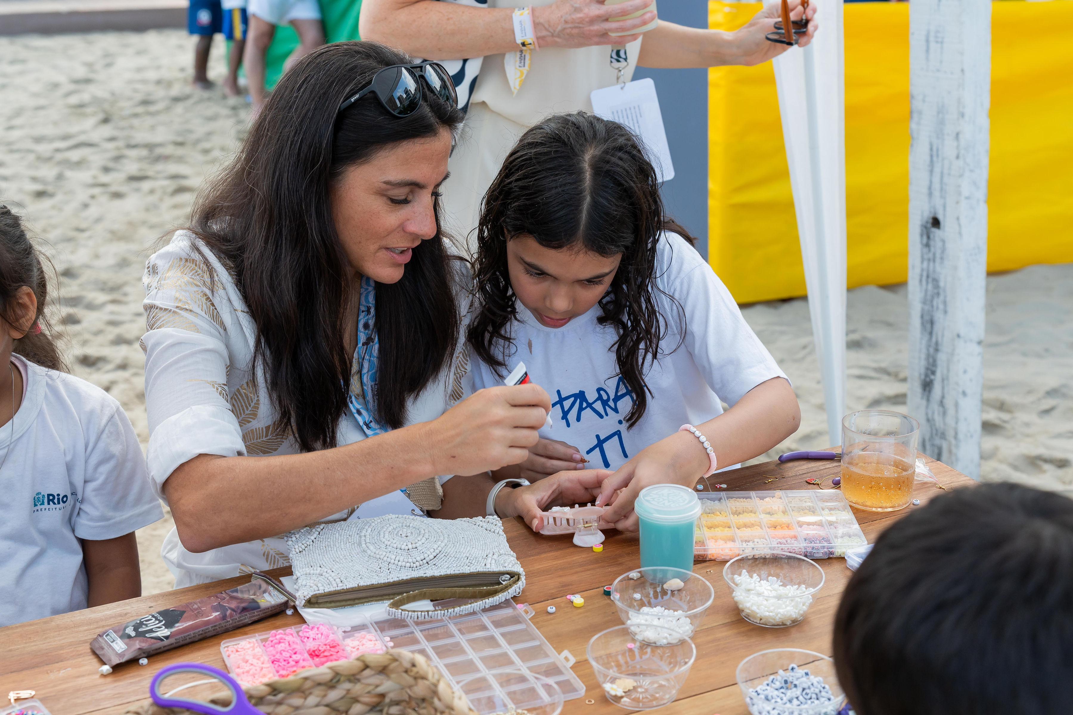Children enjoying a hands-on craft activity during Chris Carnero Day